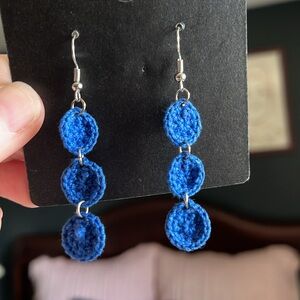 Royal blue handcrafted crochet earrings.